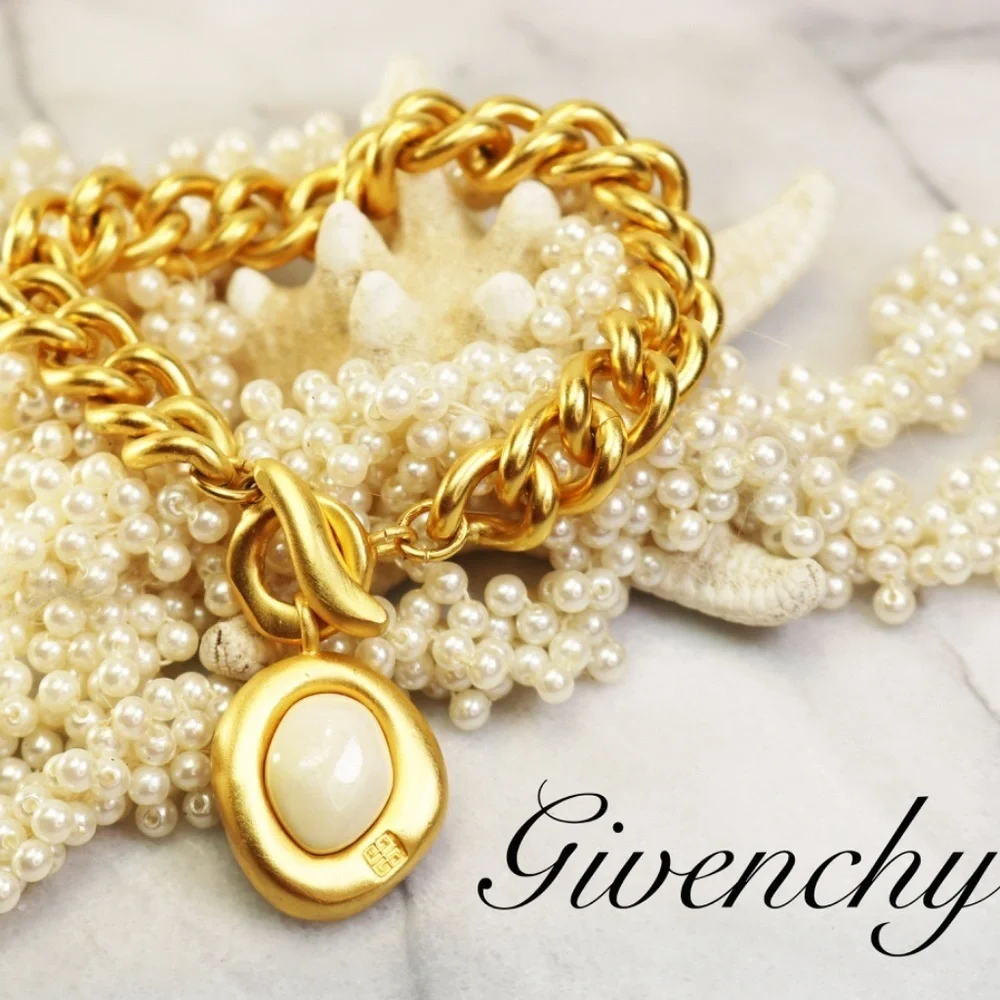 Givenchy Gold Plated Chunky Bracelet with Toggle Clasp and Logo Milk Pendant EUC